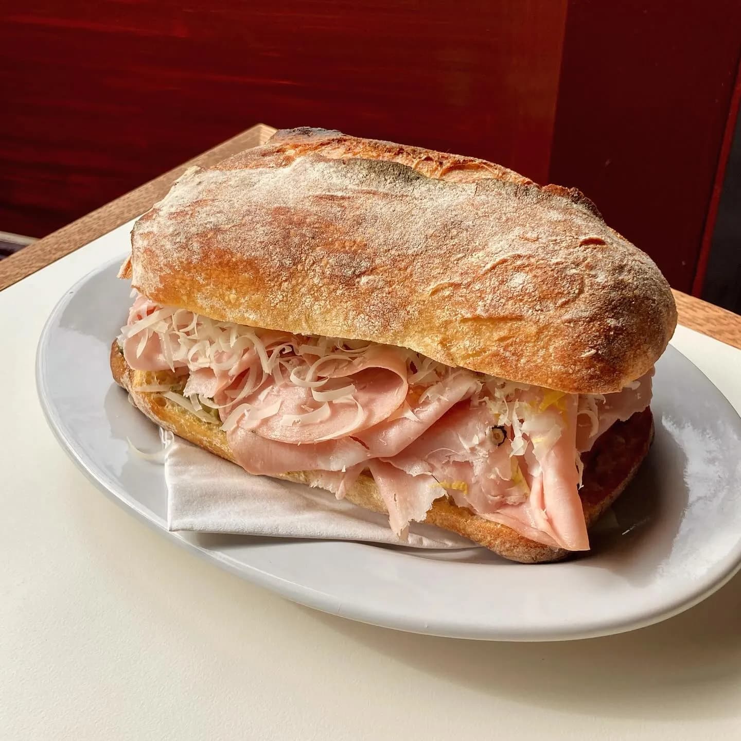 Mortadella ciabatta and a frozen drink at Nowadays' backyard