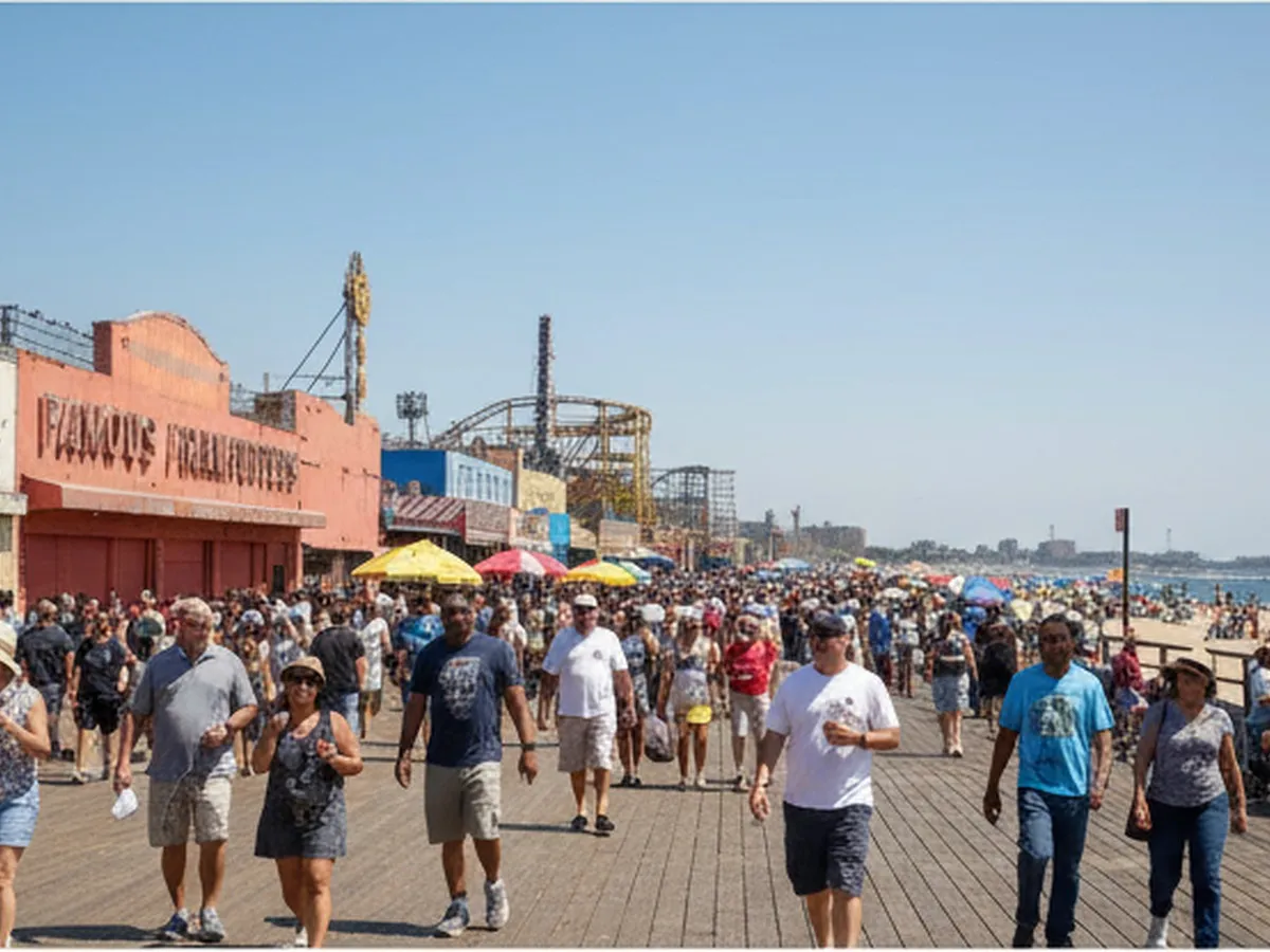 Wide summertime shot of Coney Island boardwalk near Surf Avenue, packed with spectators under bright July sun, Nathan’s Famous storefront in the distance, subway tracks overhead, beach and amusement rides fading into the background.