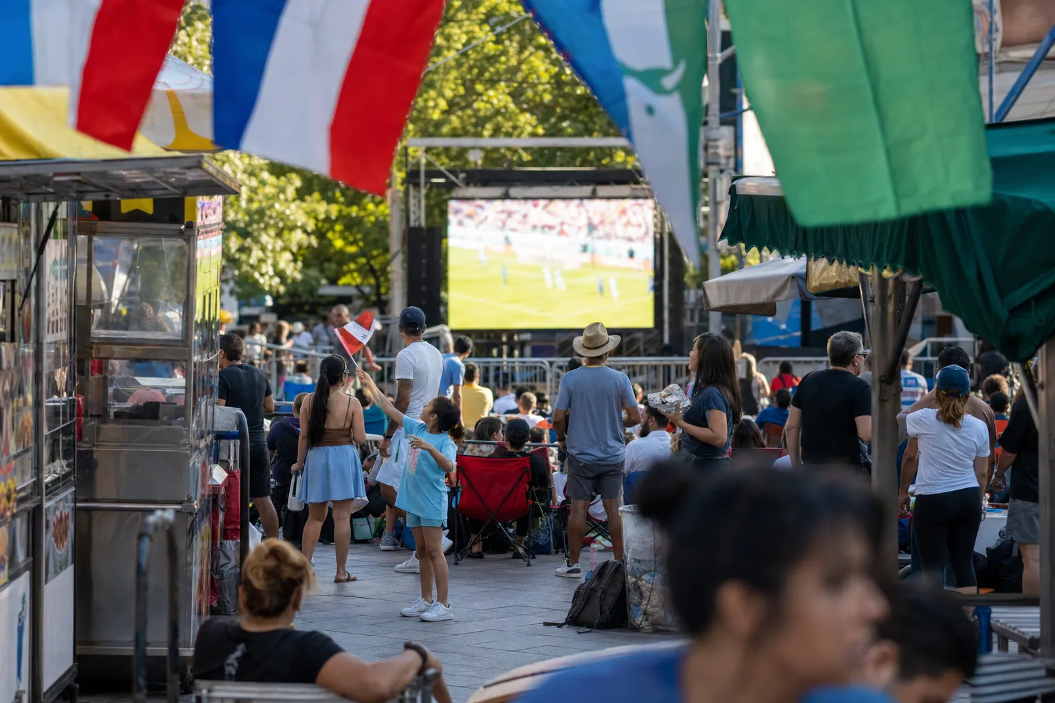 Can Astoria NYC Make Watch World Cup 2026 Work as a Transit-First Match Day? - bright varied World Cup viewing scene 2