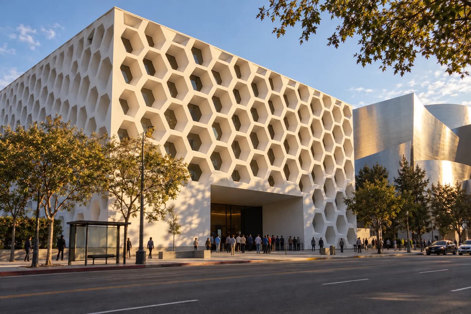 A white perforated honeycomb museum facade on a downtown avenue