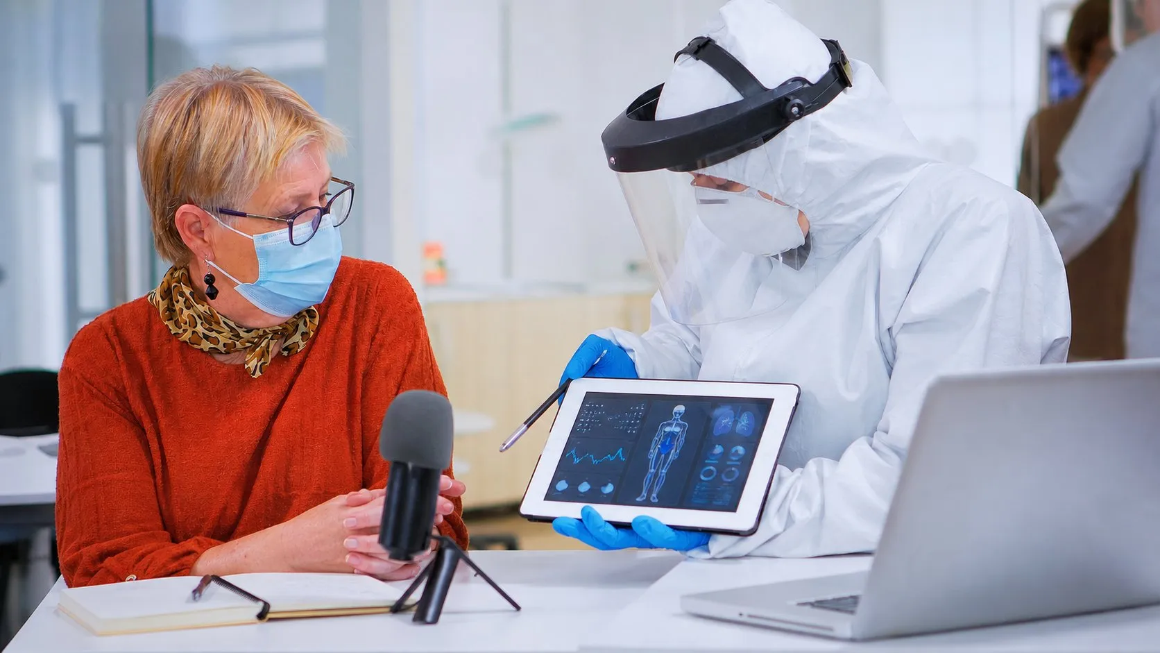 A photorealistic AI medical scribe work moment showing where Heidi Health fits before a city decision