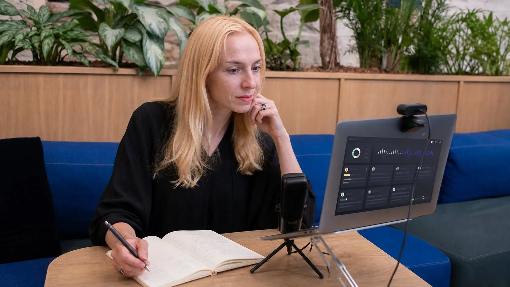A photorealistic AI meeting assistant work moment showing where MeetGeek fits before a city decision