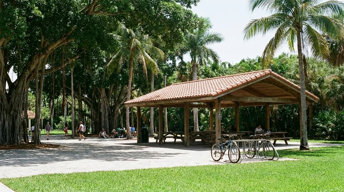 A Miami neighbourhood park with palm shade and picnic tables at midday