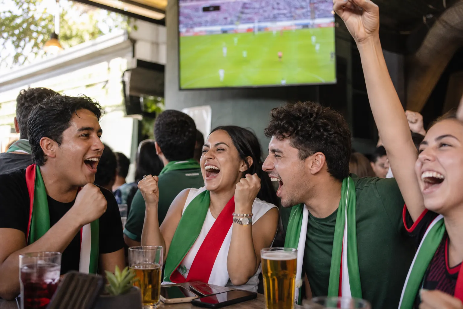 Mexico forward role analysis scene with fans watching a bright match screen