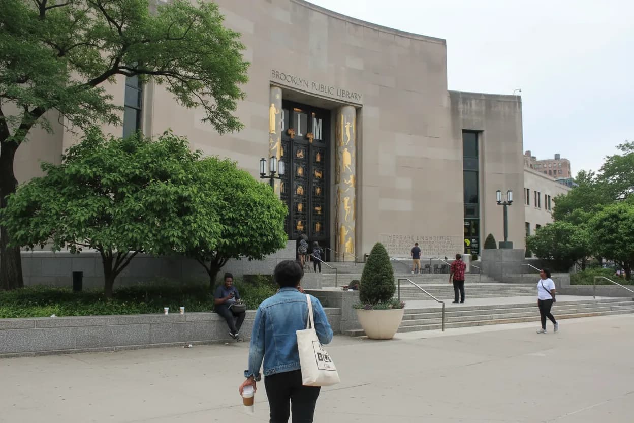 NYC experience scene for Central Library Business Desk Check for Brooklyn Freelancers Between Gigs