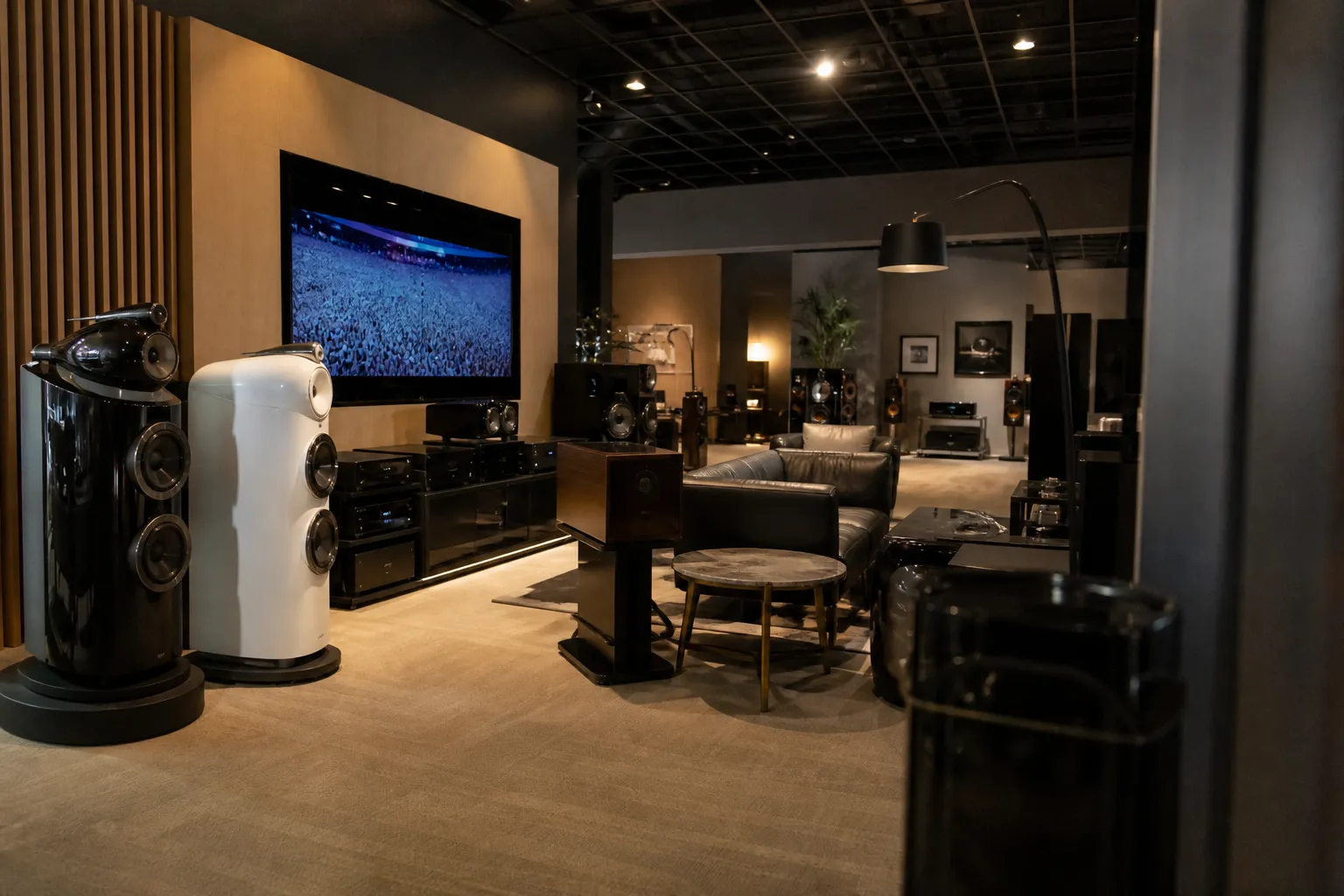 Wide-angle view of a well-organized consumer electronics store aisle showing smart home devices and displays.
