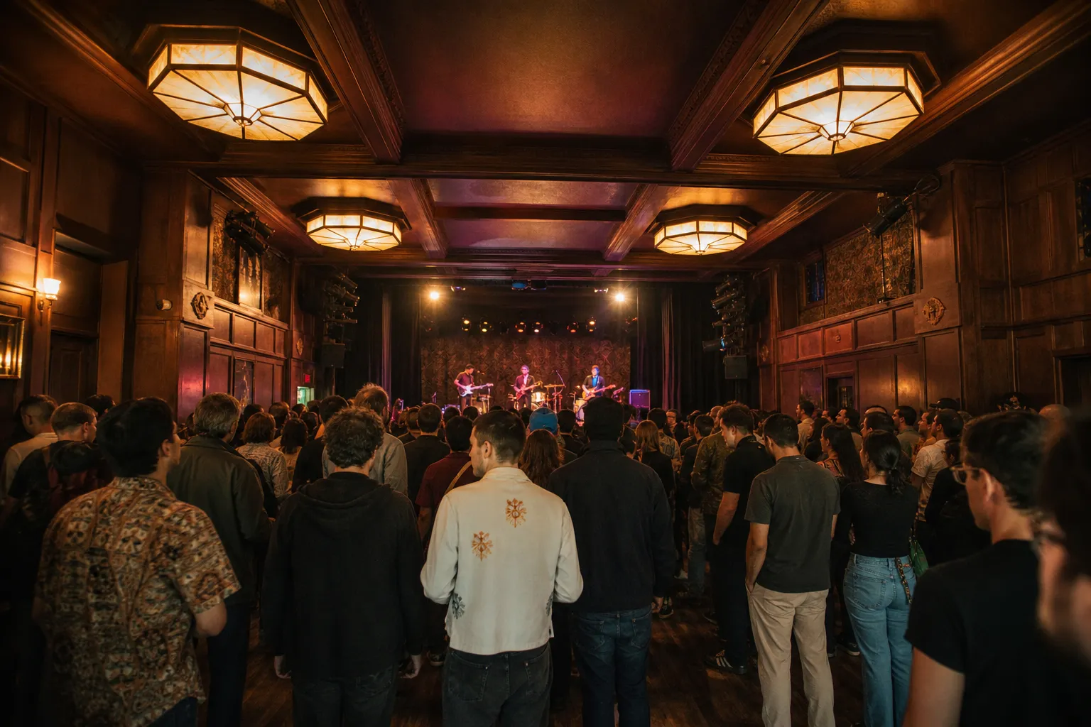 A lively concert crowd gathered inside the historic wood-paneled Lodge Room venue in Highland Park.