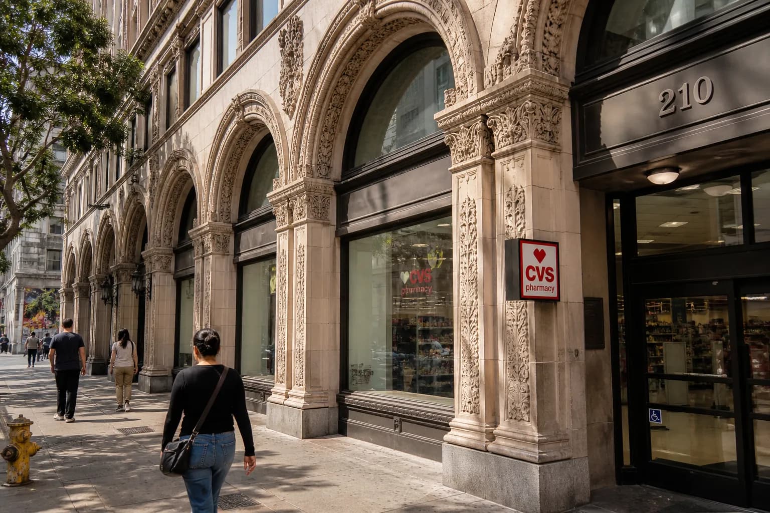 Ornate historic stone facade of the CVS building on 7th and Broadway in the Historic Core of Downtown Los Angeles.