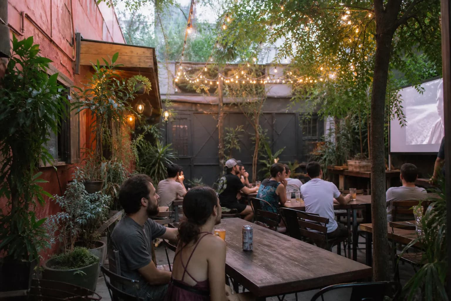 Patrons relaxing at the outdoor cafe behind Brain Dead Studios in Fairfax.
