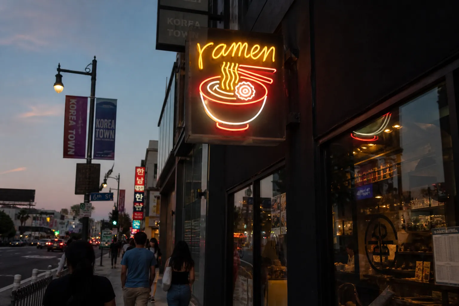 Neon-lit Koreatown street scene in Los Angeles with a ramen shop sign glowing above late-night foot traffic