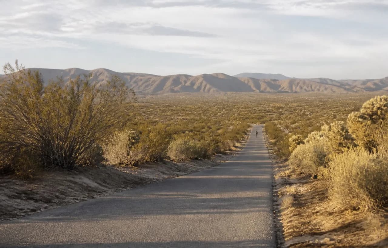 Dry scrubland road running east out of Los Angeles