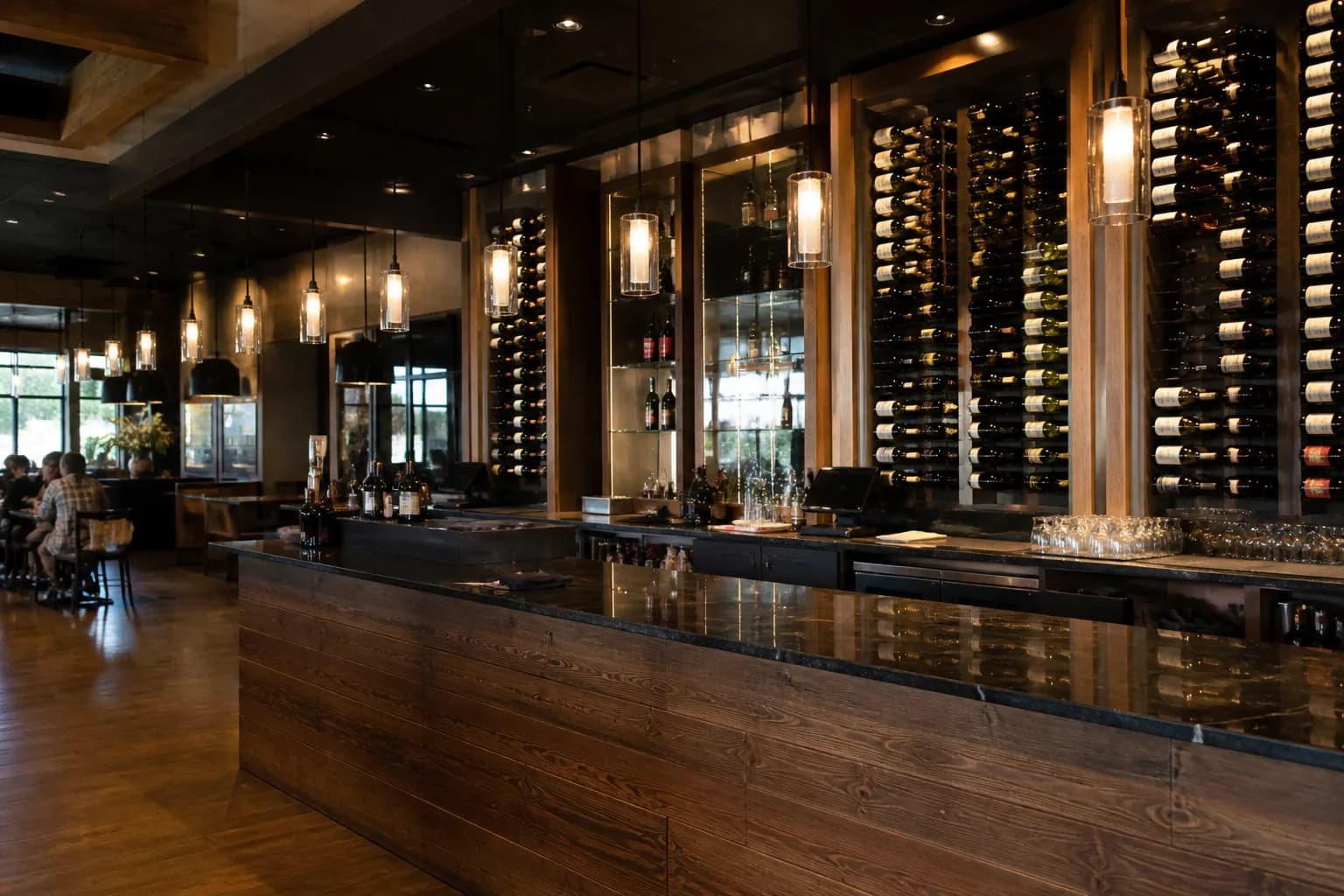 A close-up shot of two wine glasses clinking over a rustic wooden flight board at a modern wine bar counter.
