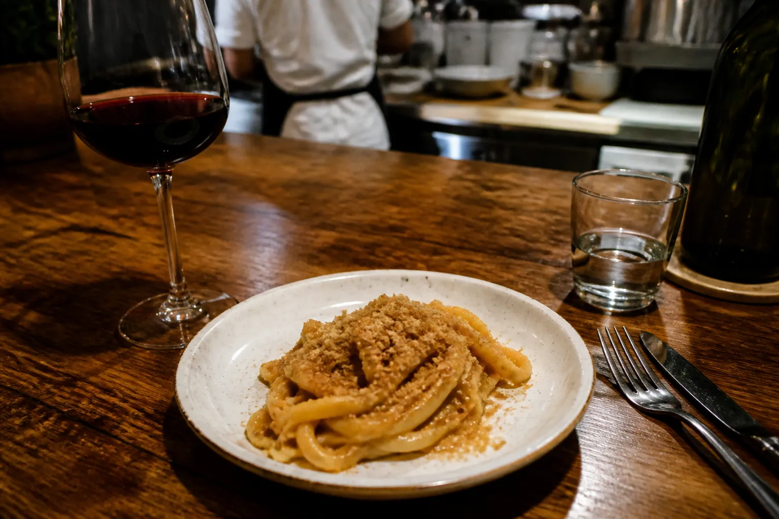 A plate of fresh handmade pasta on the bar counter at Macchialina in South Beach.