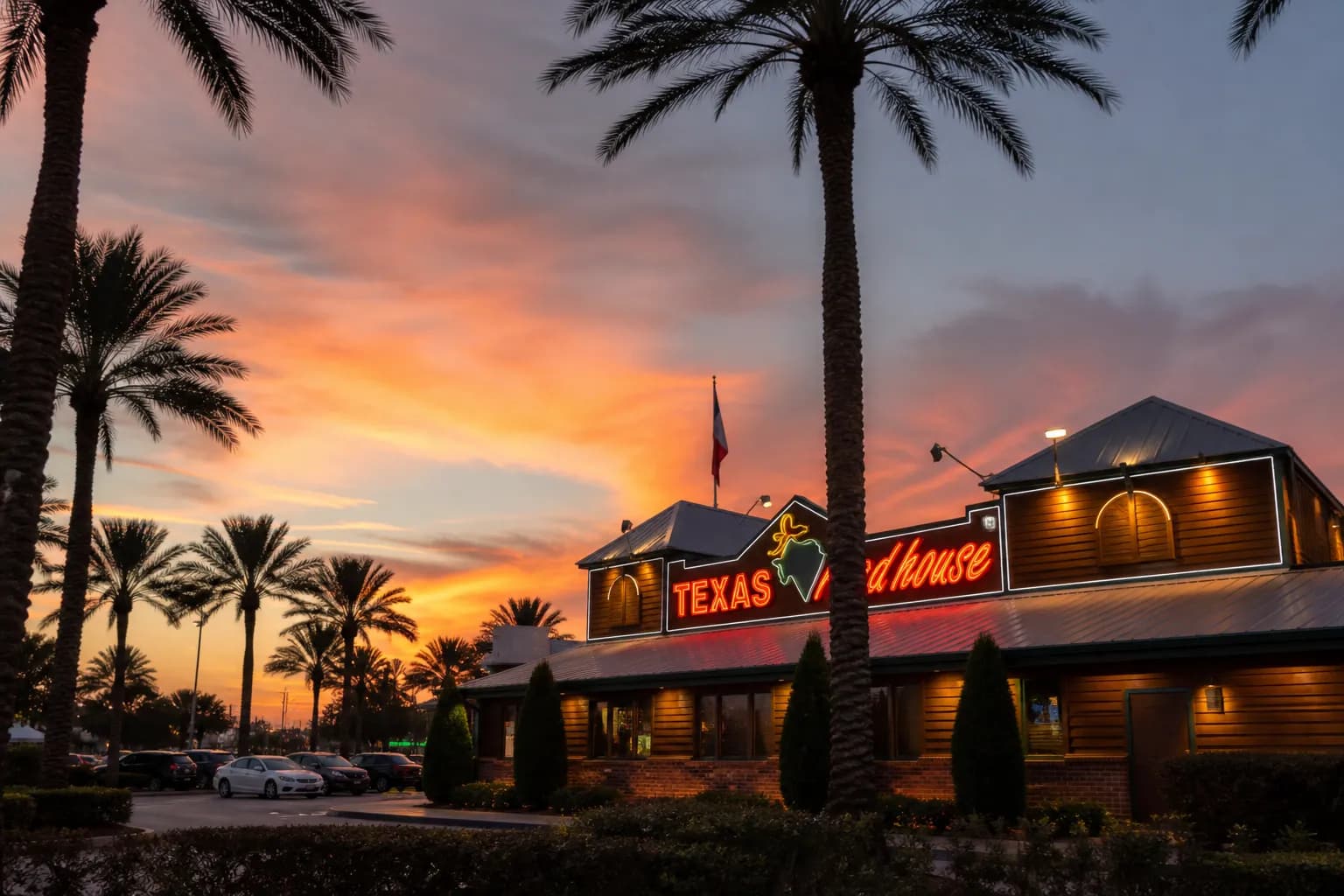 The exterior of the Miramar restaurant location during golden hour.