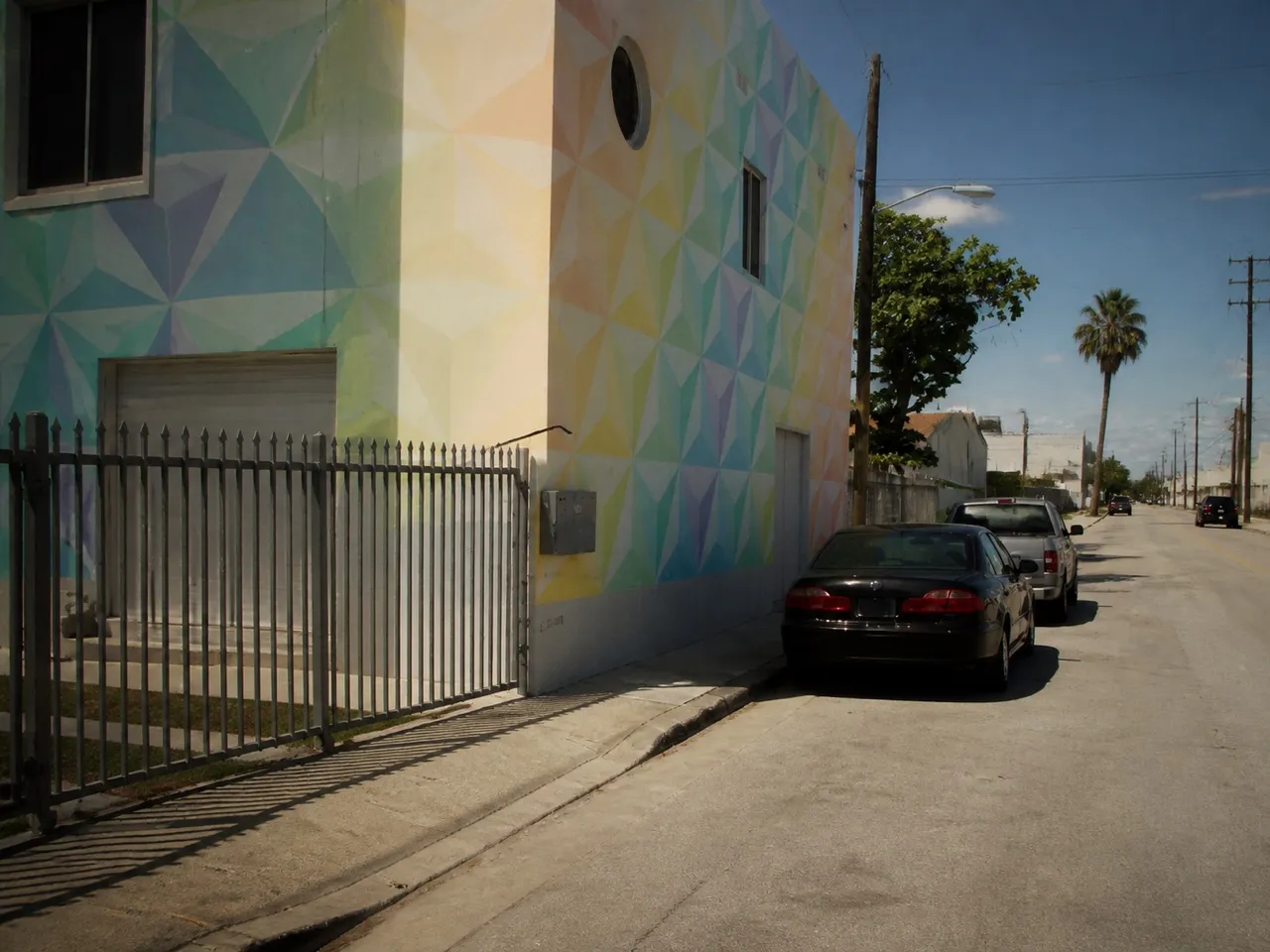 Wynwood warehouse block with painted walls under bright Miami sun