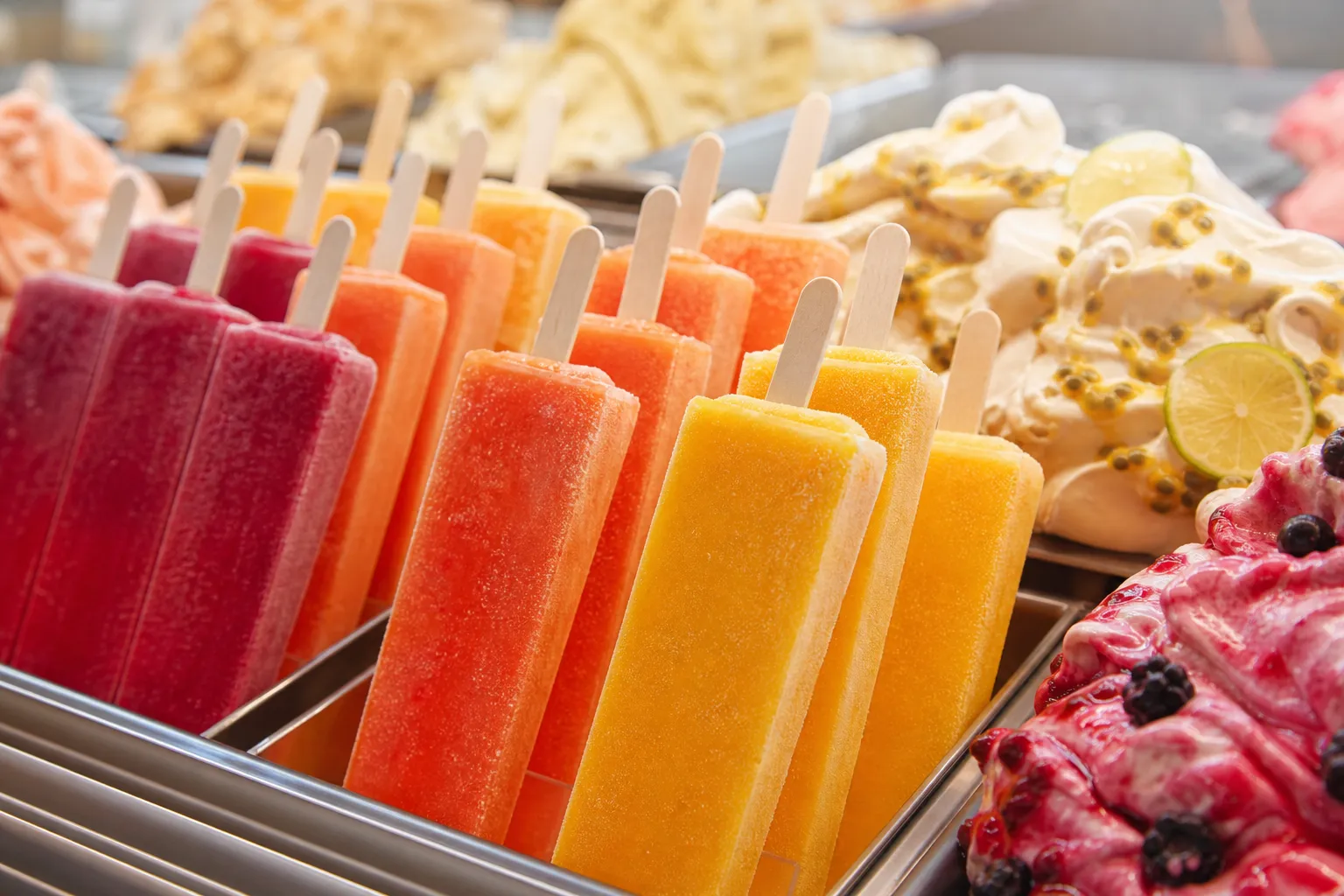 Colorful paletas and gelato textures with condensation