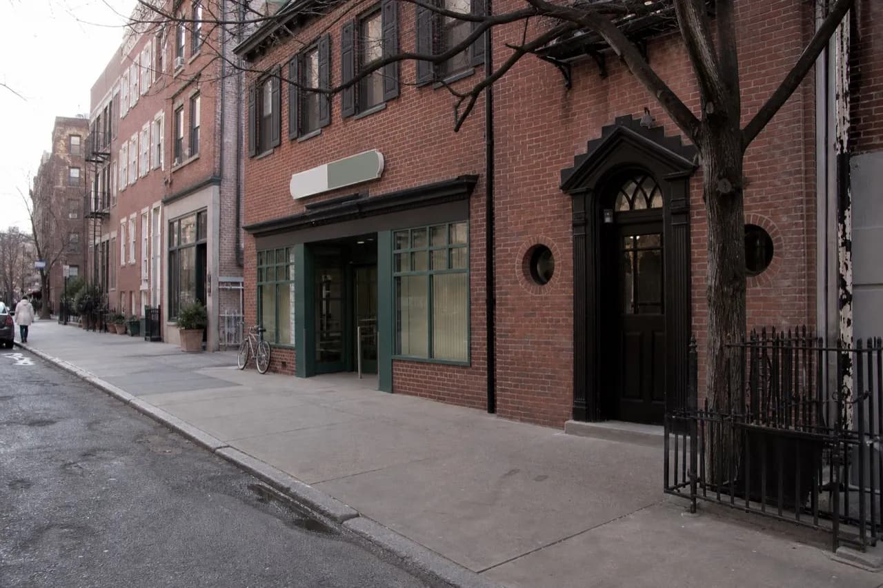 Manhattan side street with ground-floor shopfronts