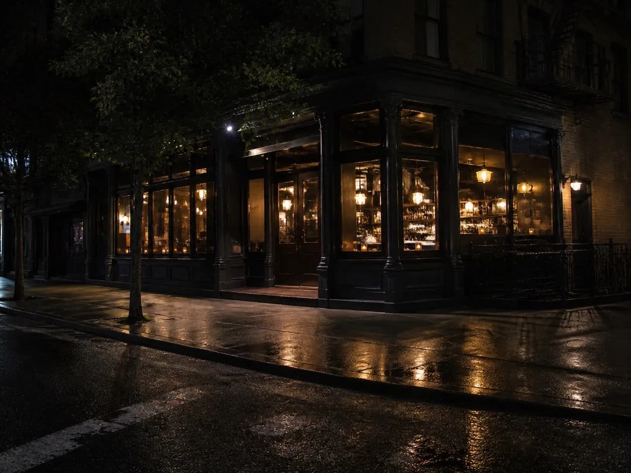 Manhattan bar frontage lit on a Saturday night