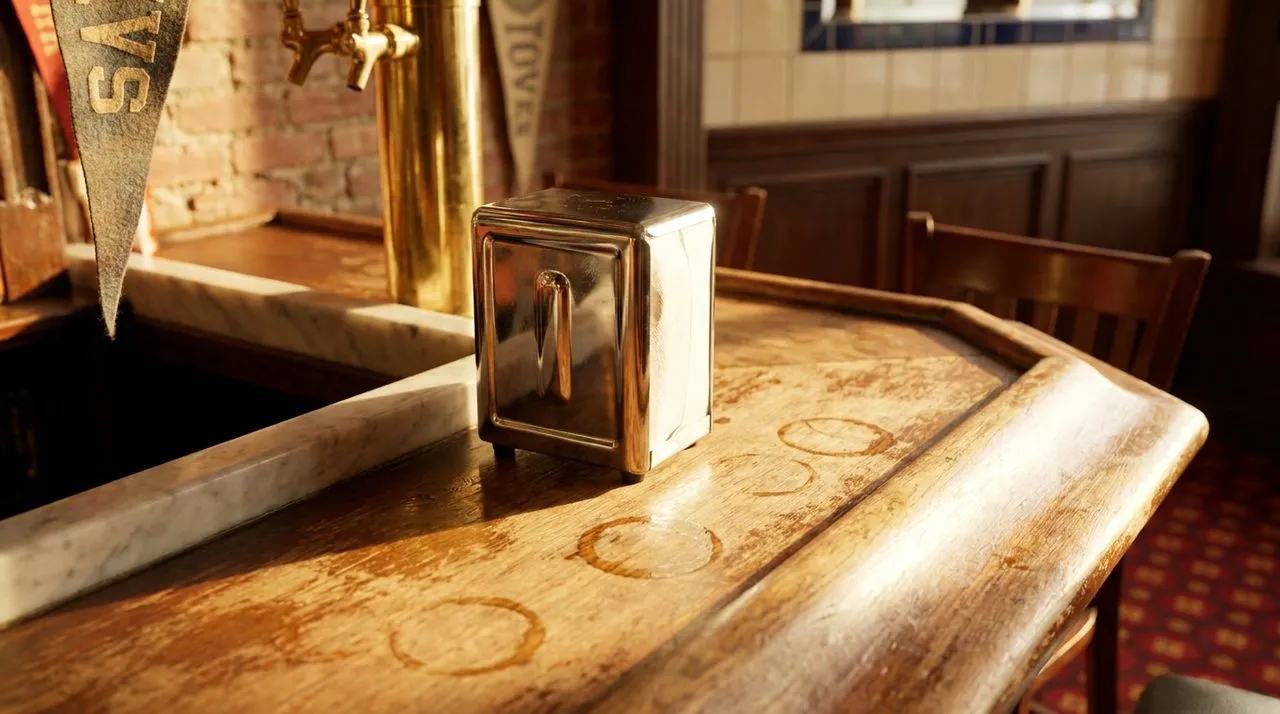 Extreme close-up of a chrome napkin holder and bar rail at a NYC sports bar end seat, condensation rings, edge of a vintage pennant blurred in background, warm afternoon raking light
