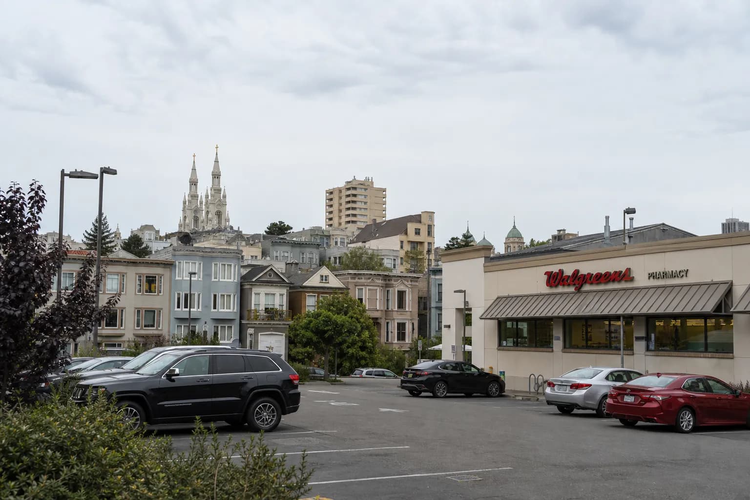 Franklin Street Walgreens in San Francisco showing its off-street parking lot and skyline