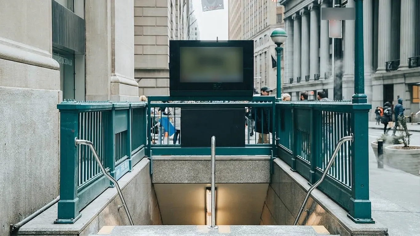 Subway station entrance on a Manhattan street, the start of a New York pizza pilgrimage