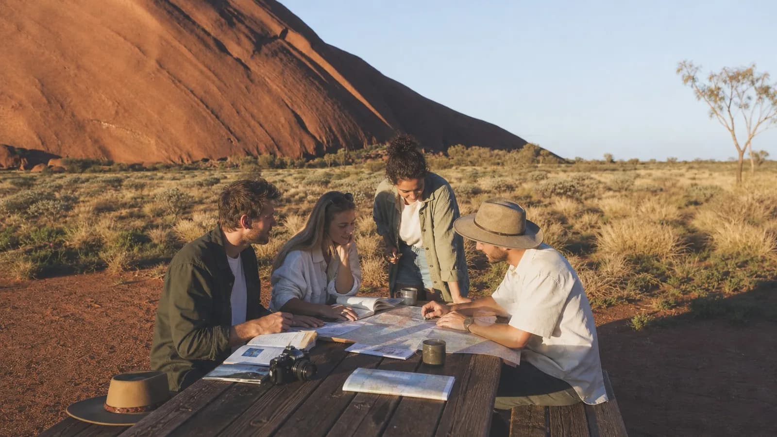 Photorealistic scene showing Karpo coordinating the wider day around TripMapper.