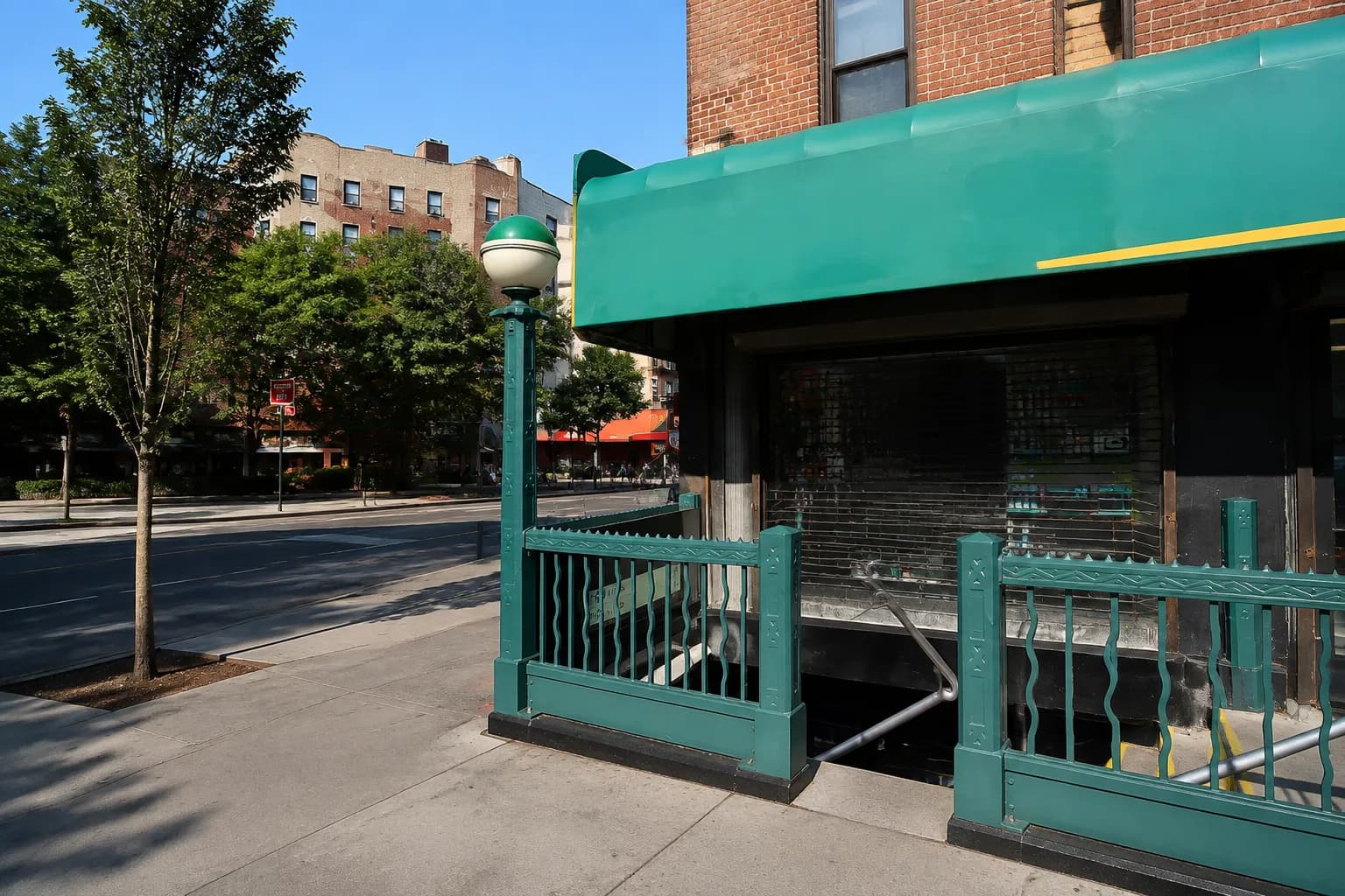 Fordham Road subway station entrance in the Bronx on a clear summer morning