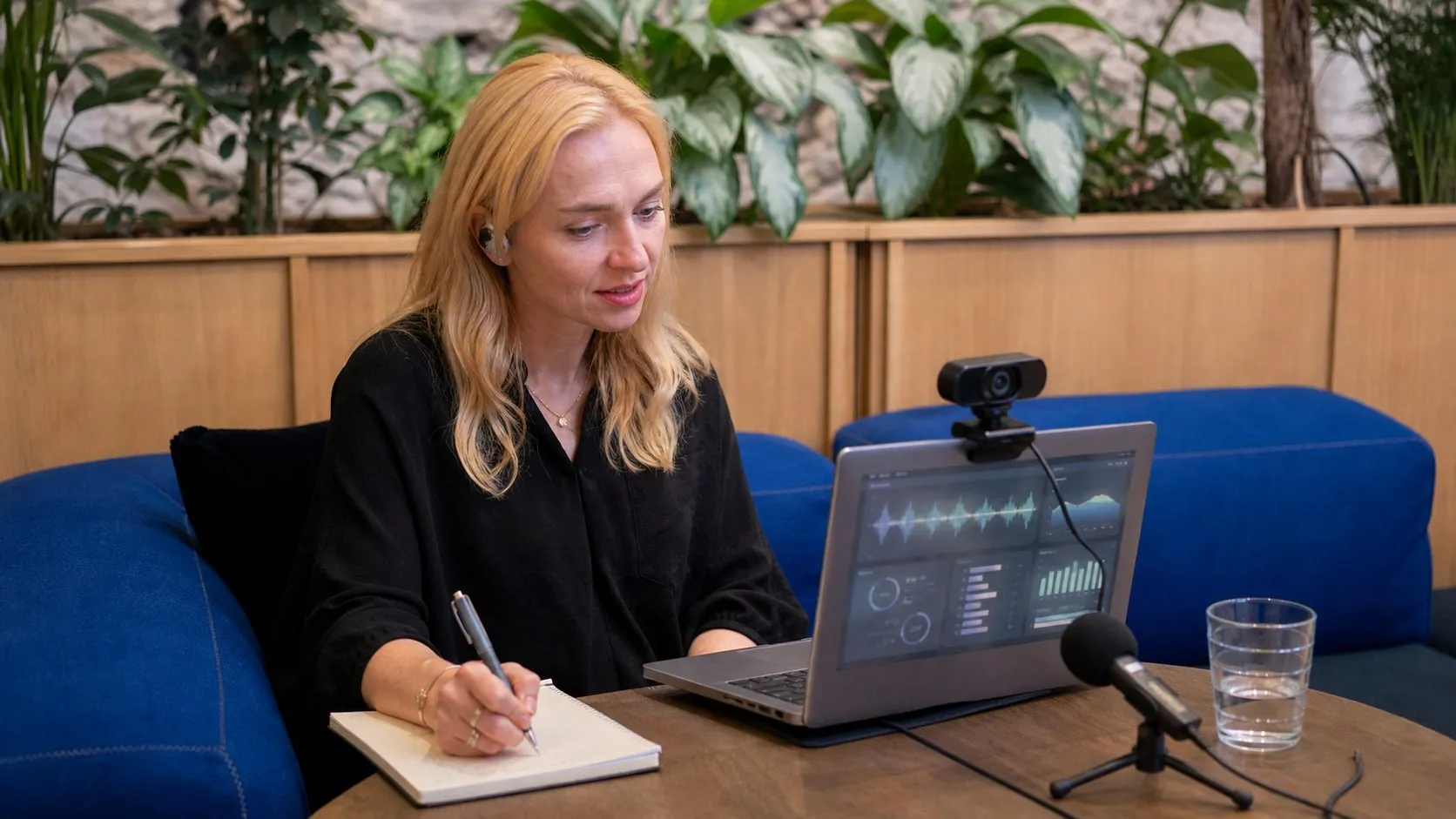 A photorealistic AI meeting and audio assistant work moment showing where Krisp fits before a city decision