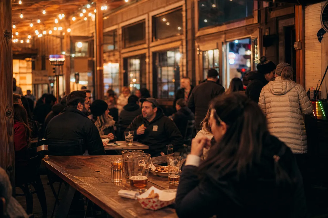NYC experience scene for AL All-Stars vs NL All-Stars at Pig Beach Queens: A BBQ-Hall Screen Plan for Mixed Mets-Yankees Groups