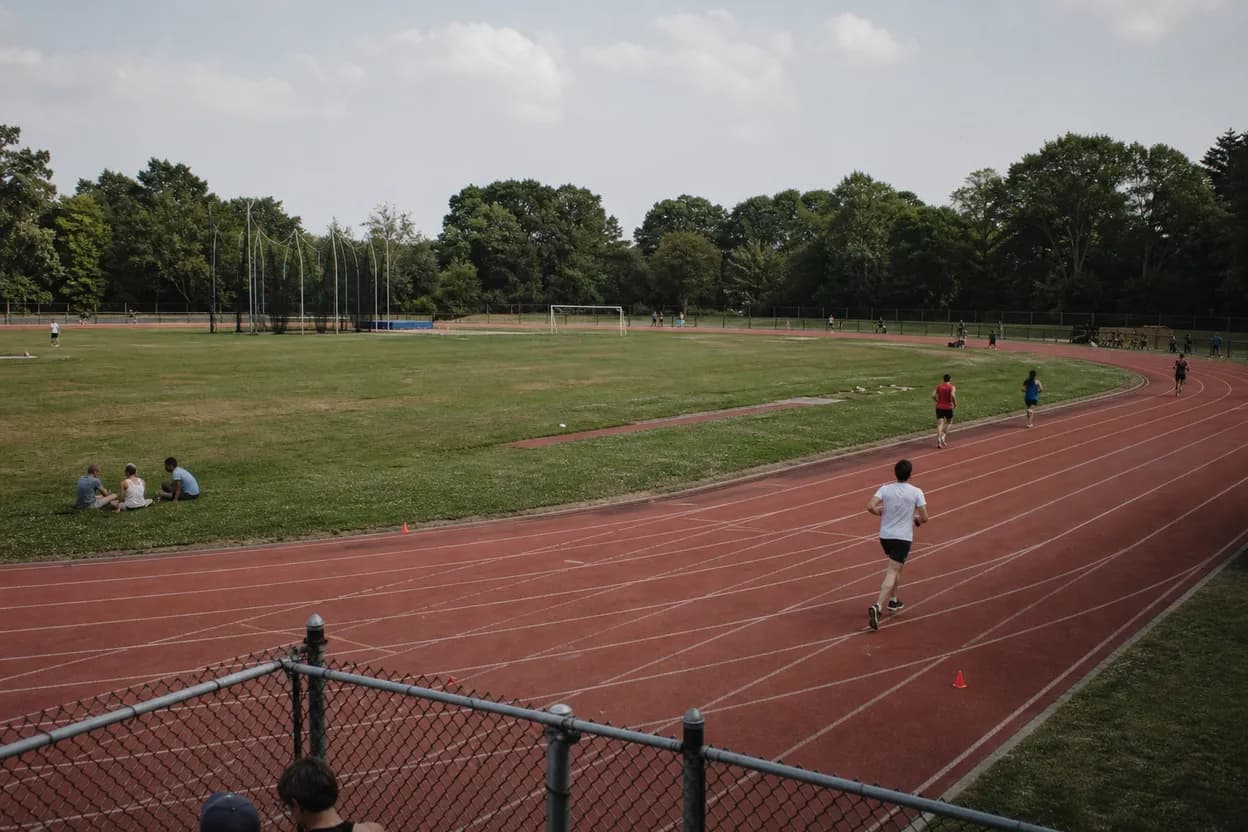 Cover scene for Al Oerter Track Morning Laps: A Queens Running Plan Before the Heat Builds