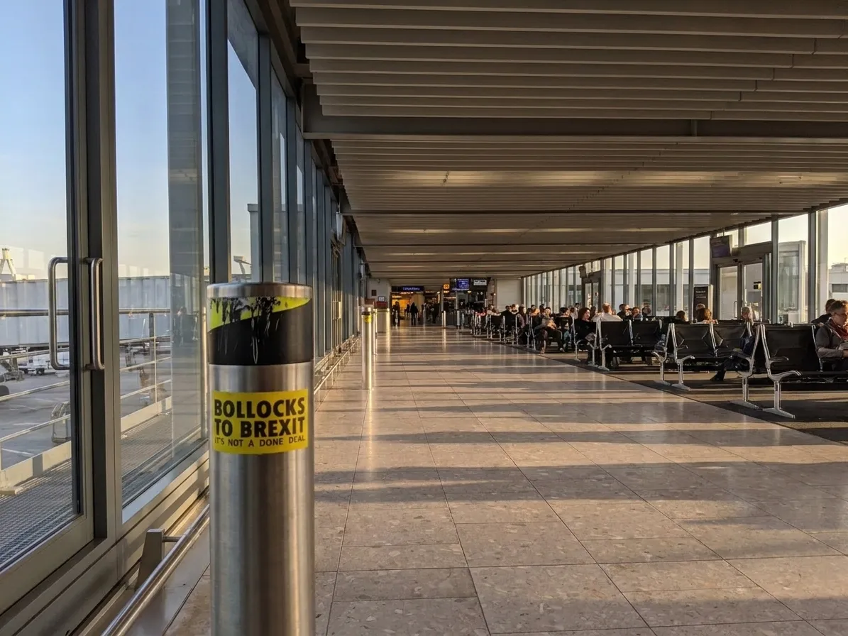 Hollywood Burbank Airport Terminal A concourse with large windows and gate seating areas