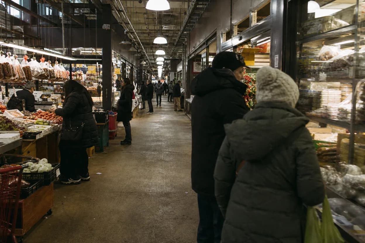 NYC experience scene for Arthur Avenue Retail Market With a Stroller: A Bronx Lunch Route That Works