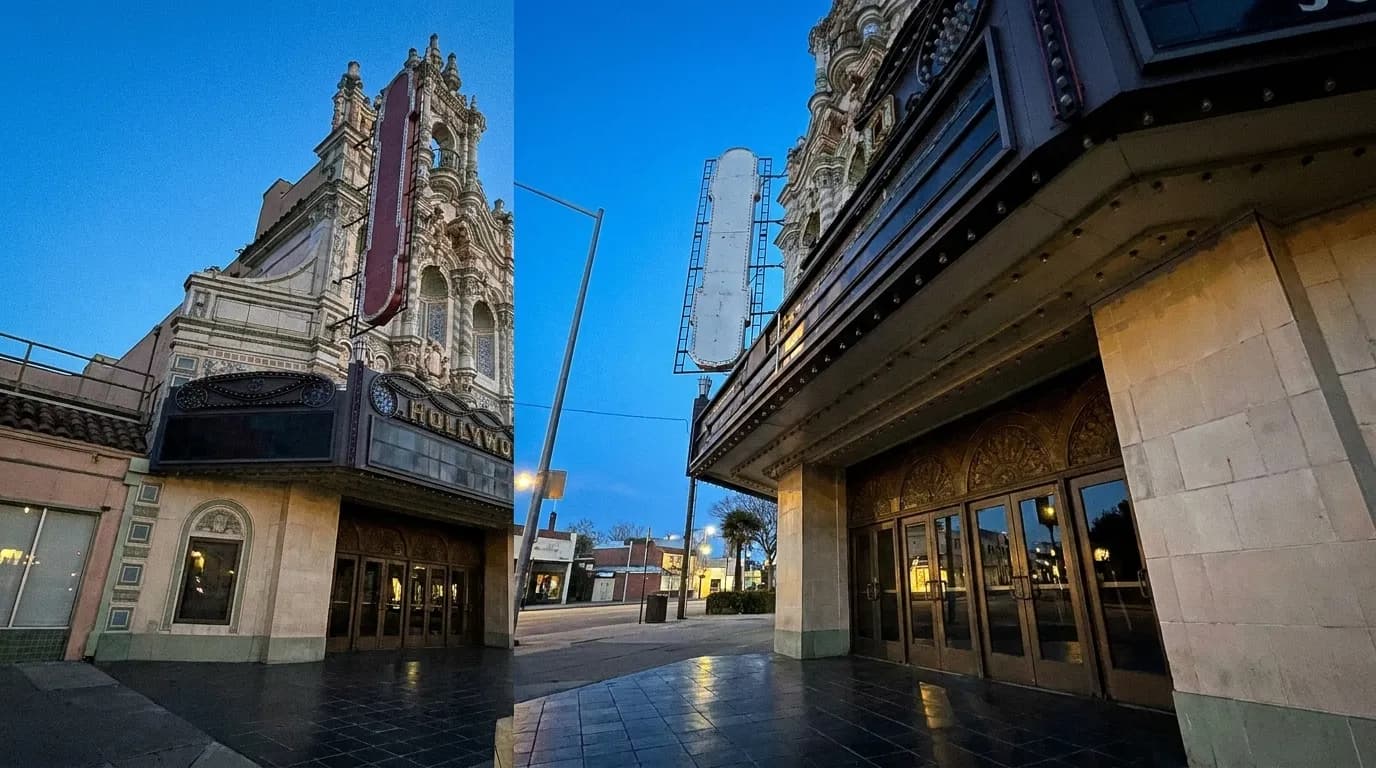 A historic cinema facade at dusk with a projecting marquee