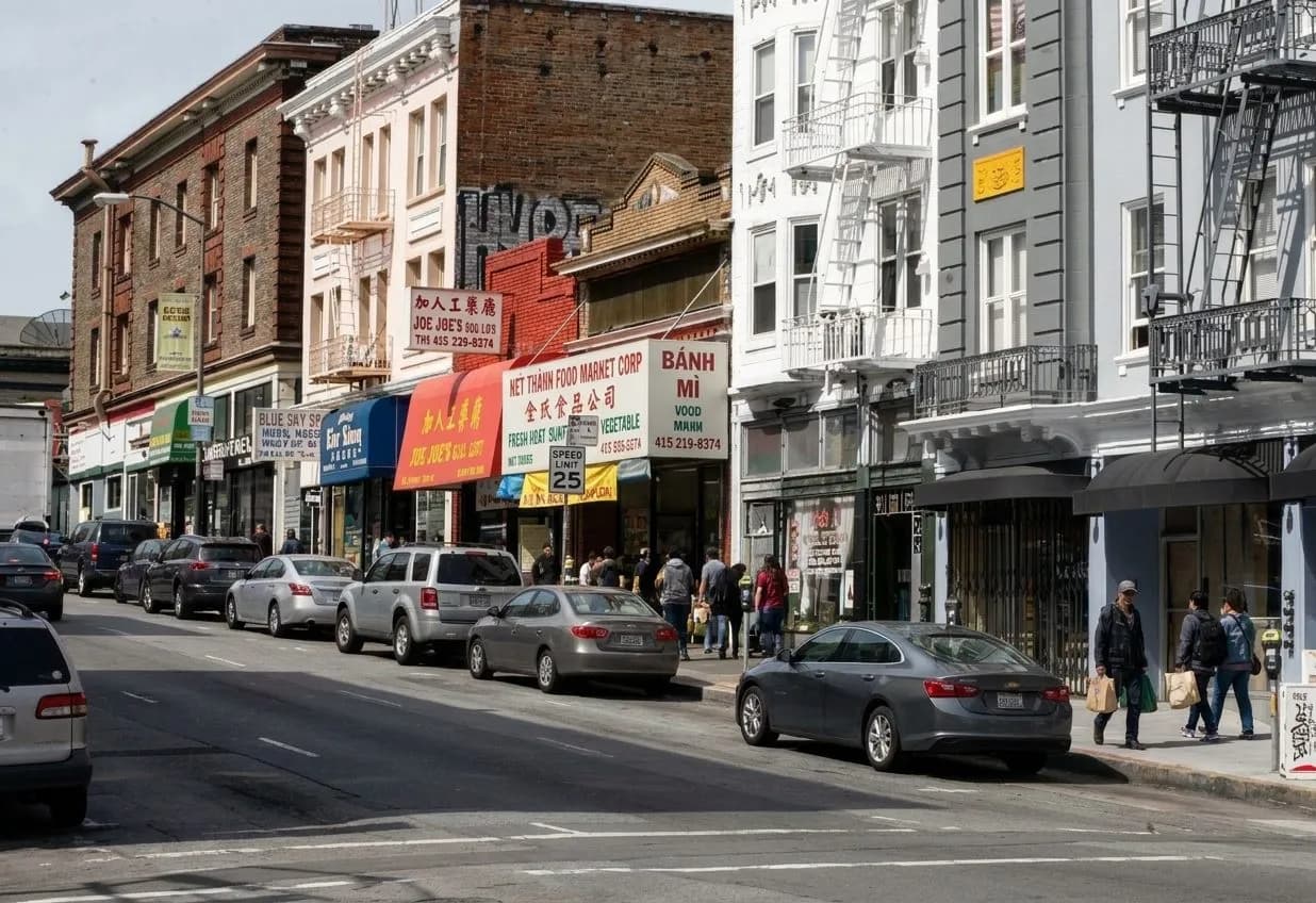 Larkin Street in San Francisco's Little Saigon with a sandwich shop front and passing foot traffic
