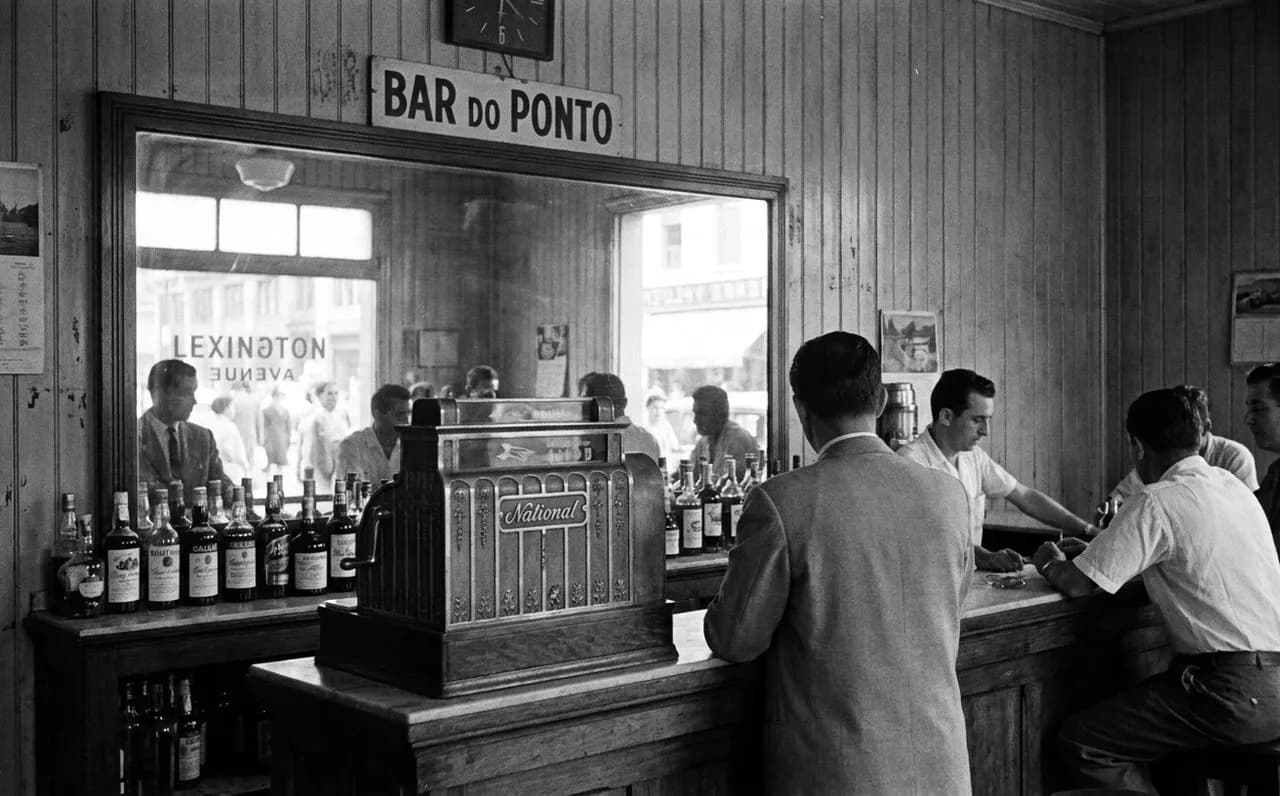 Bar seating at Peter's Since 1969 where the cash register still prints carbon receipts