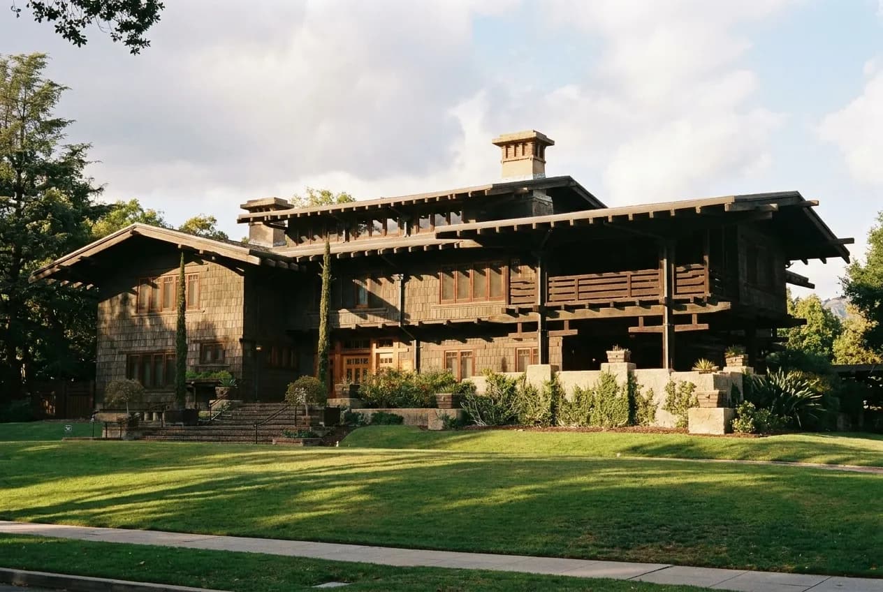 Craftsman-style house museum exterior in Pasadena surrounded by mature trees