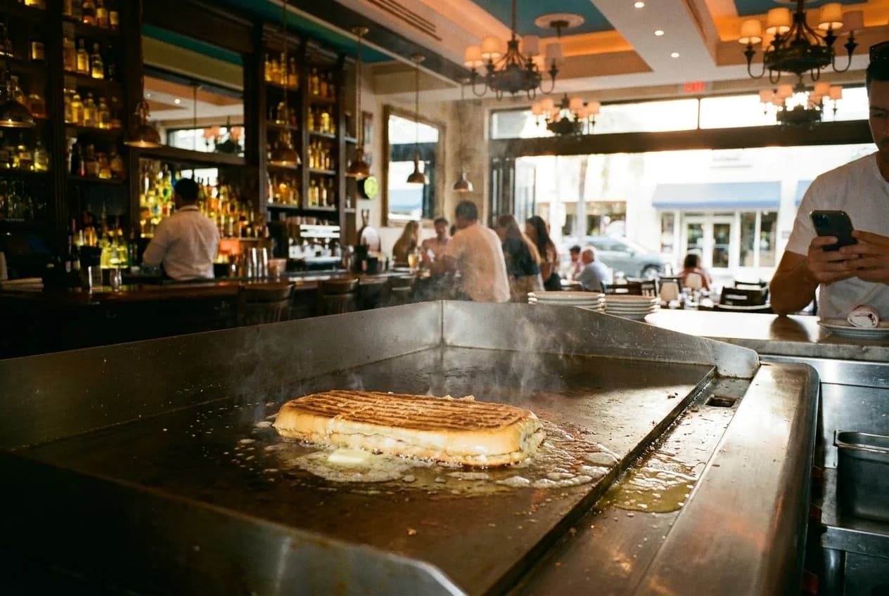 Tostada cubana pressed on plancha griddle with butter and grill marks