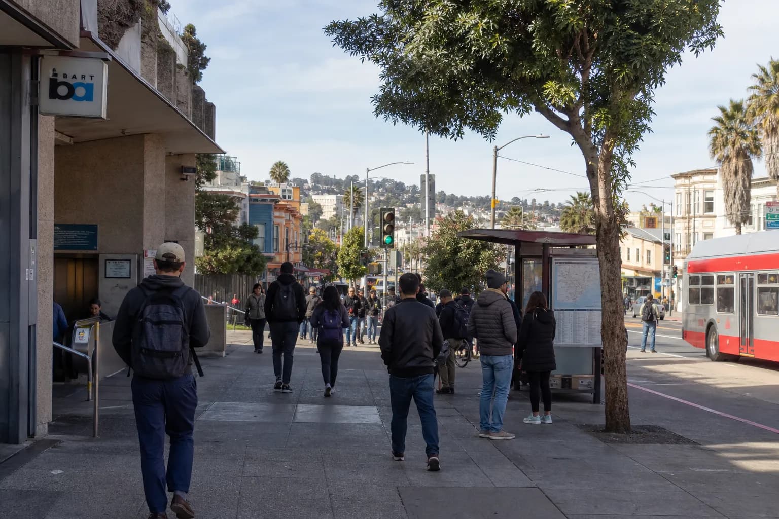 Weekend transit scene near the Mission for brunch plans