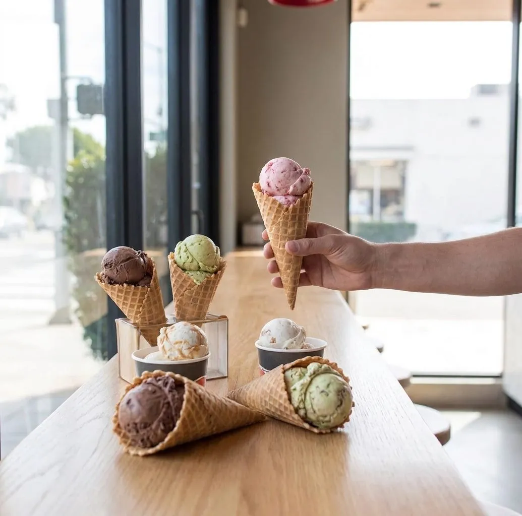 Ice cream scoops and waffle cones on a Los Angeles dessert counter