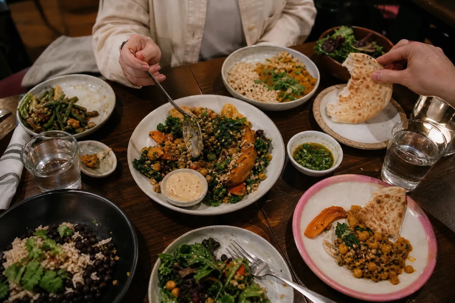 Vegan dinner plates on a Mission restaurant table