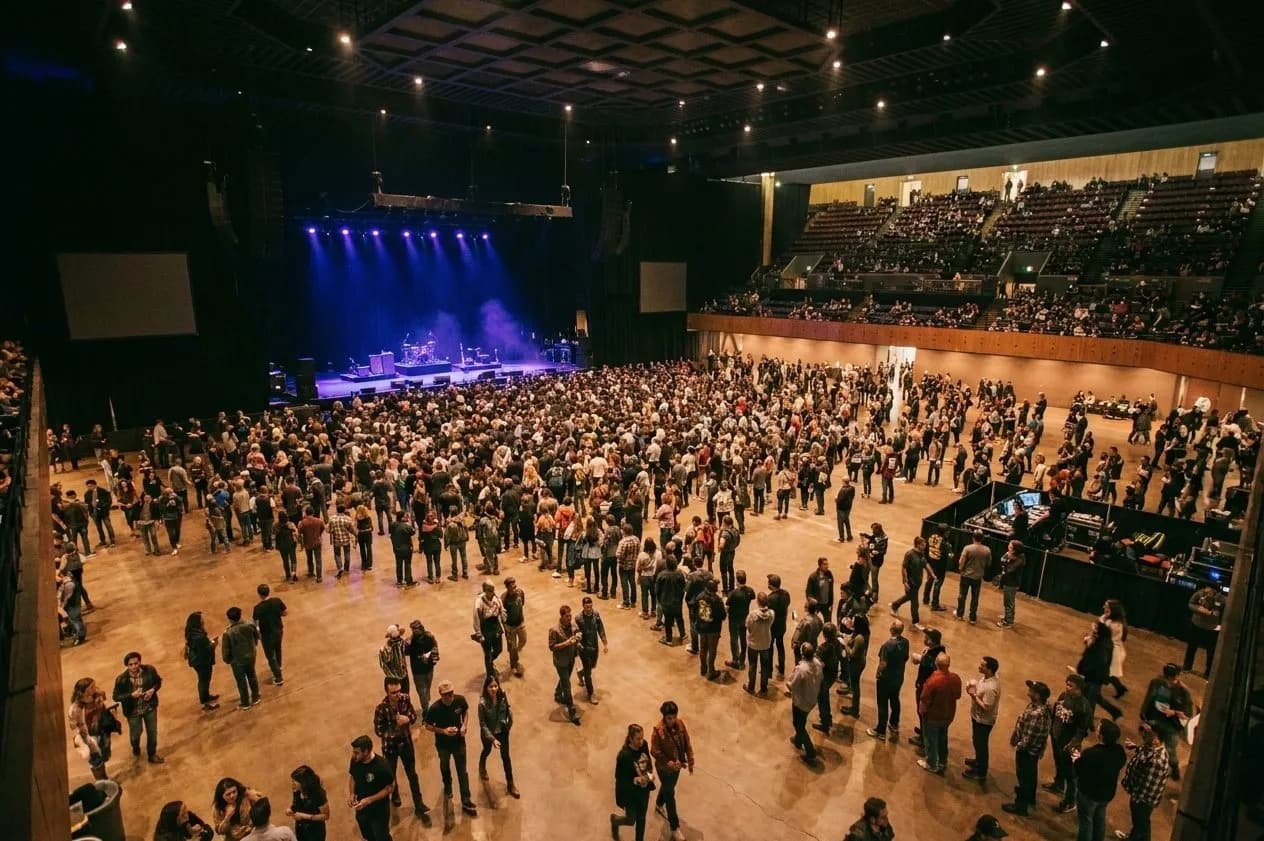 Wide interior view of Bill Graham Civic Auditorium during concert entry