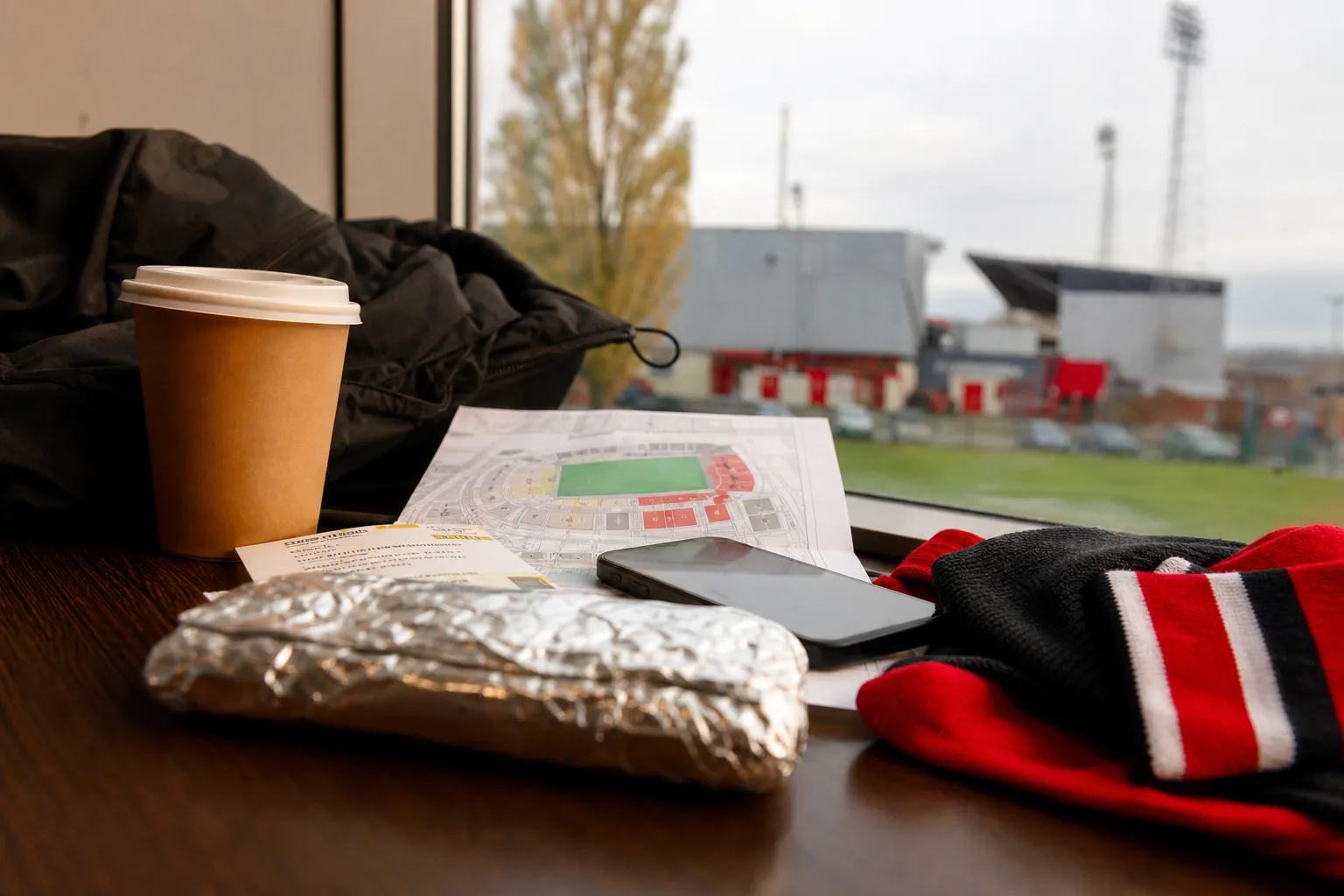 A bright practical scene for bronze match versus final schedule rest days and travel demands.
