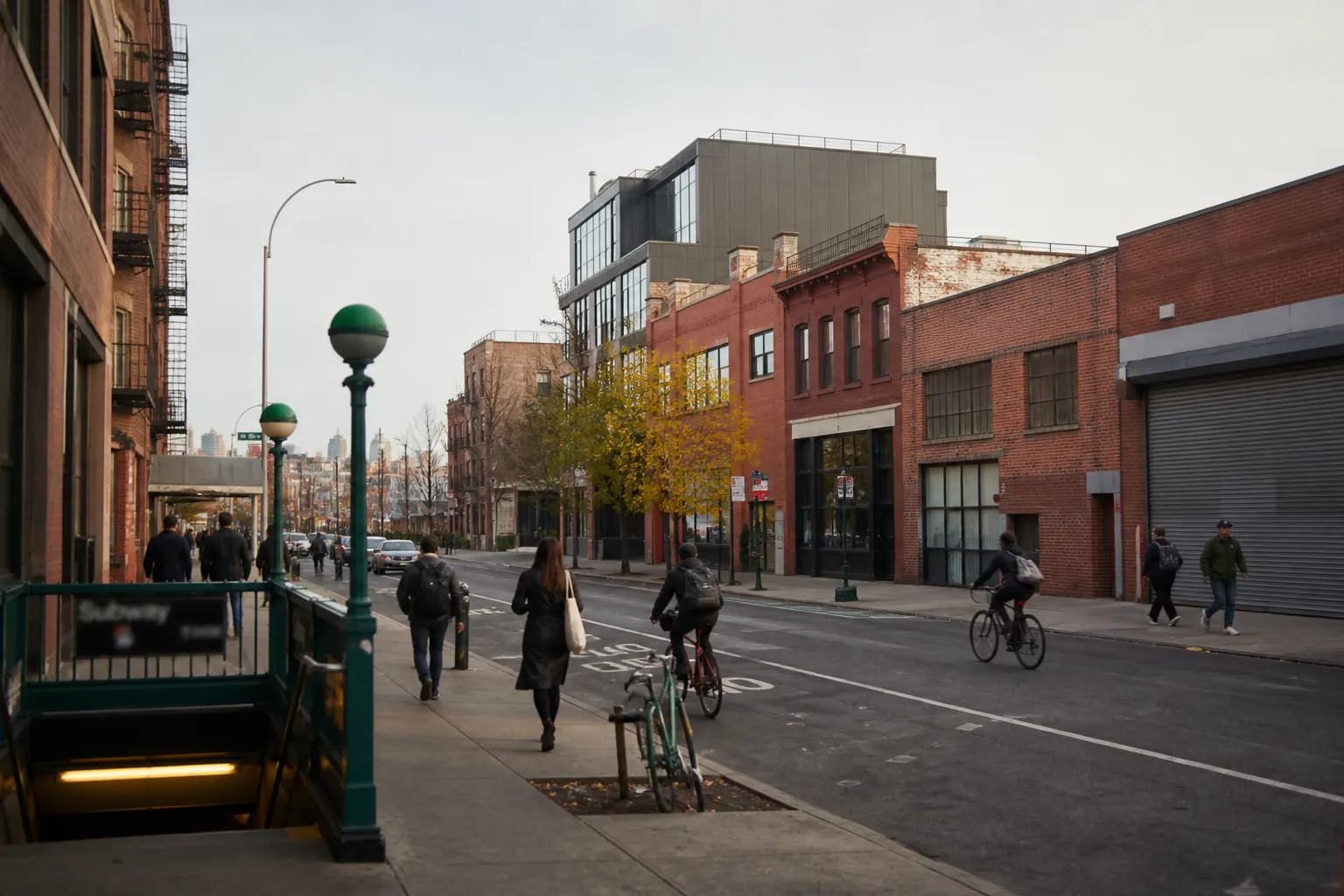 Weekend street scene near Williamsburg arts spaces with people walking past studios