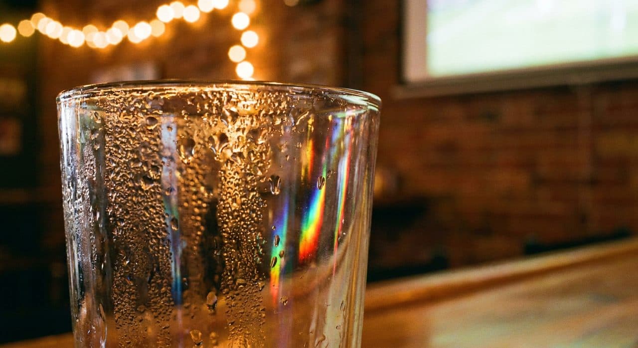 A Bushwick Bar at the FIFA World Cup 2026 Knockout Round, Projector On and Standing Room Only scene