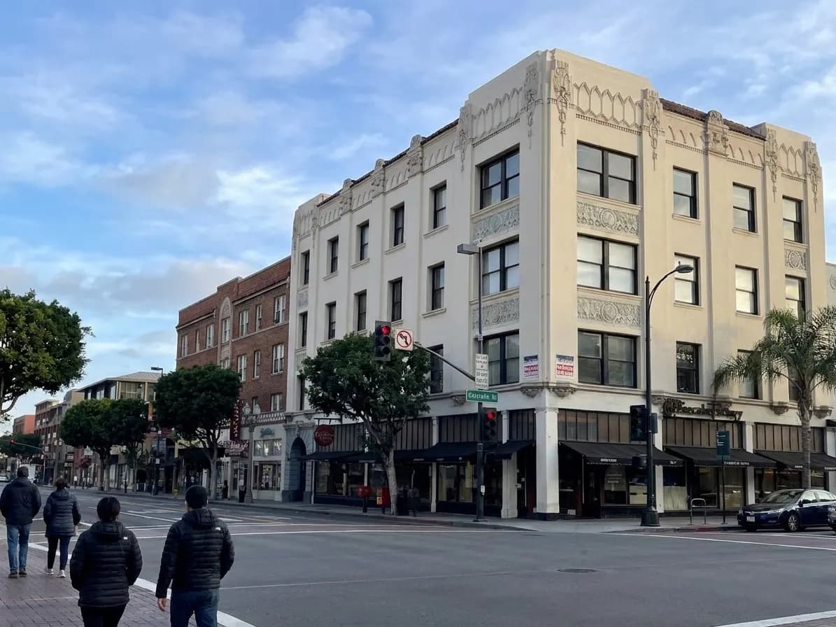 Colorado Boulevard in Pasadena showing historic commercial buildings and street-level retail