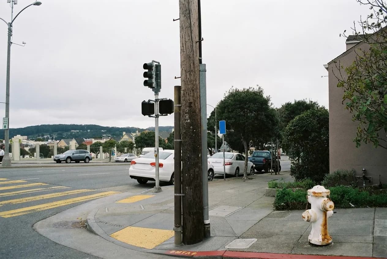 A quiet avenue in San Francisco's outer neighbourhoods with low houses and grey sky