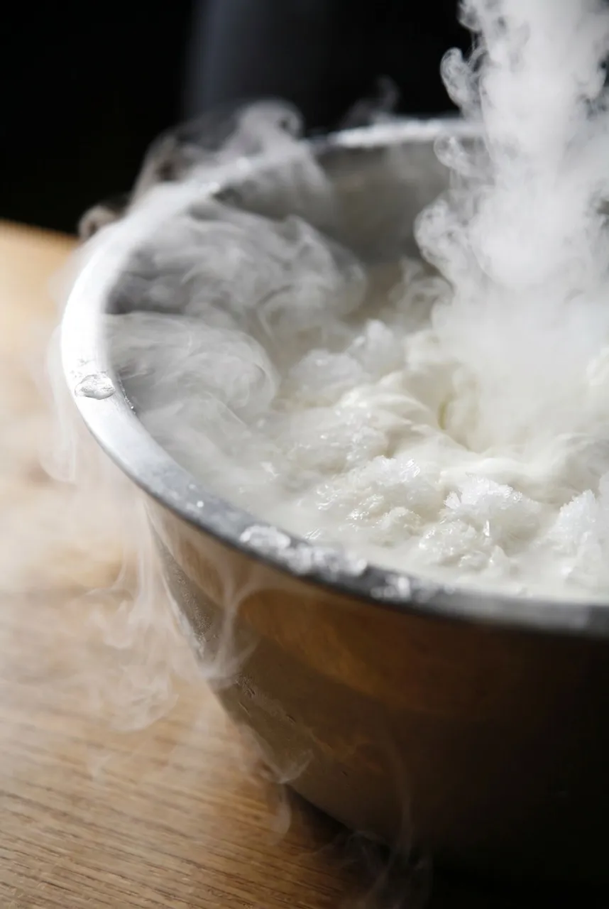 Liquid-nitrogen vapour cloud rising from ice-cream mixer at Smitten counter in San Francisco