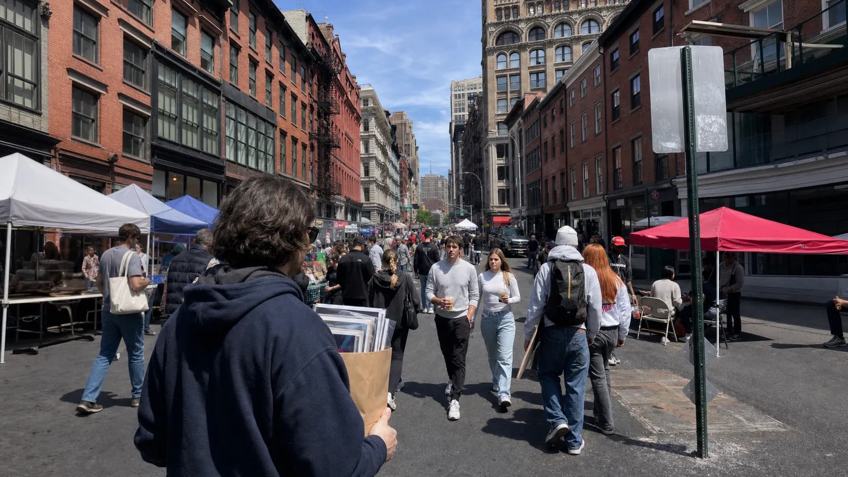 A comics shopper walking on Broadway near Union Square in New York City.