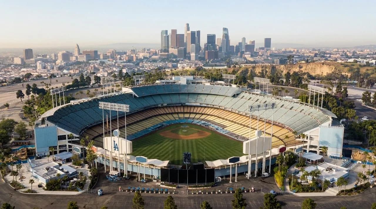 Dodger Stadium framed by Los Angeles hills in a wide exterior view