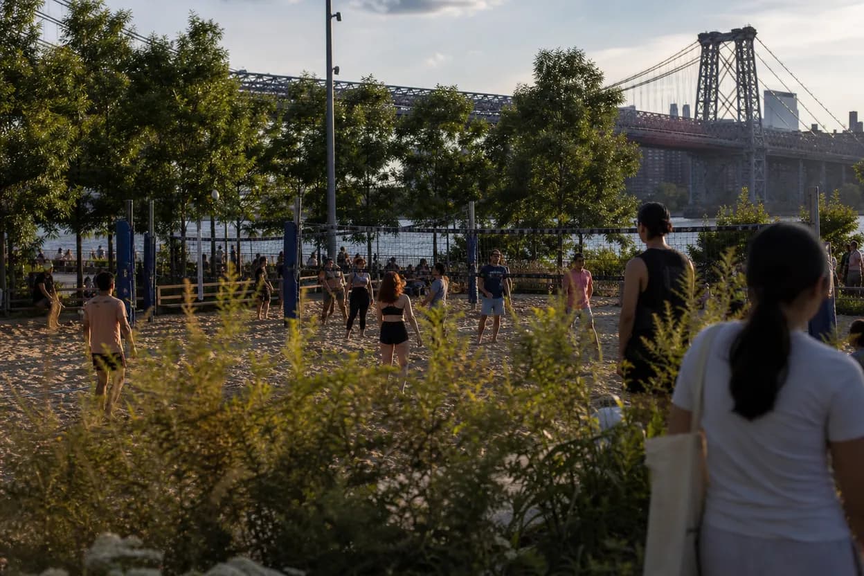 NYC experience scene for Domino Park Volleyball at Golden Hour: A Williamsburg Doubles Plan for Four